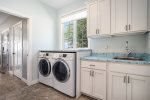 No Need to Pack Light - Blueberry Bluff Comes Equipped with Multiple Washers and Dryers for Your Sunkissed Clothes